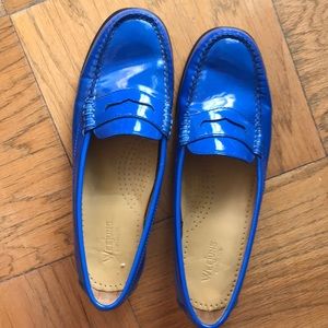 Blue patent loafer shoes